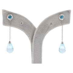 Boucles d'oreilles pendantes en or blanc massif 18 carats (750) avec topaze bleue