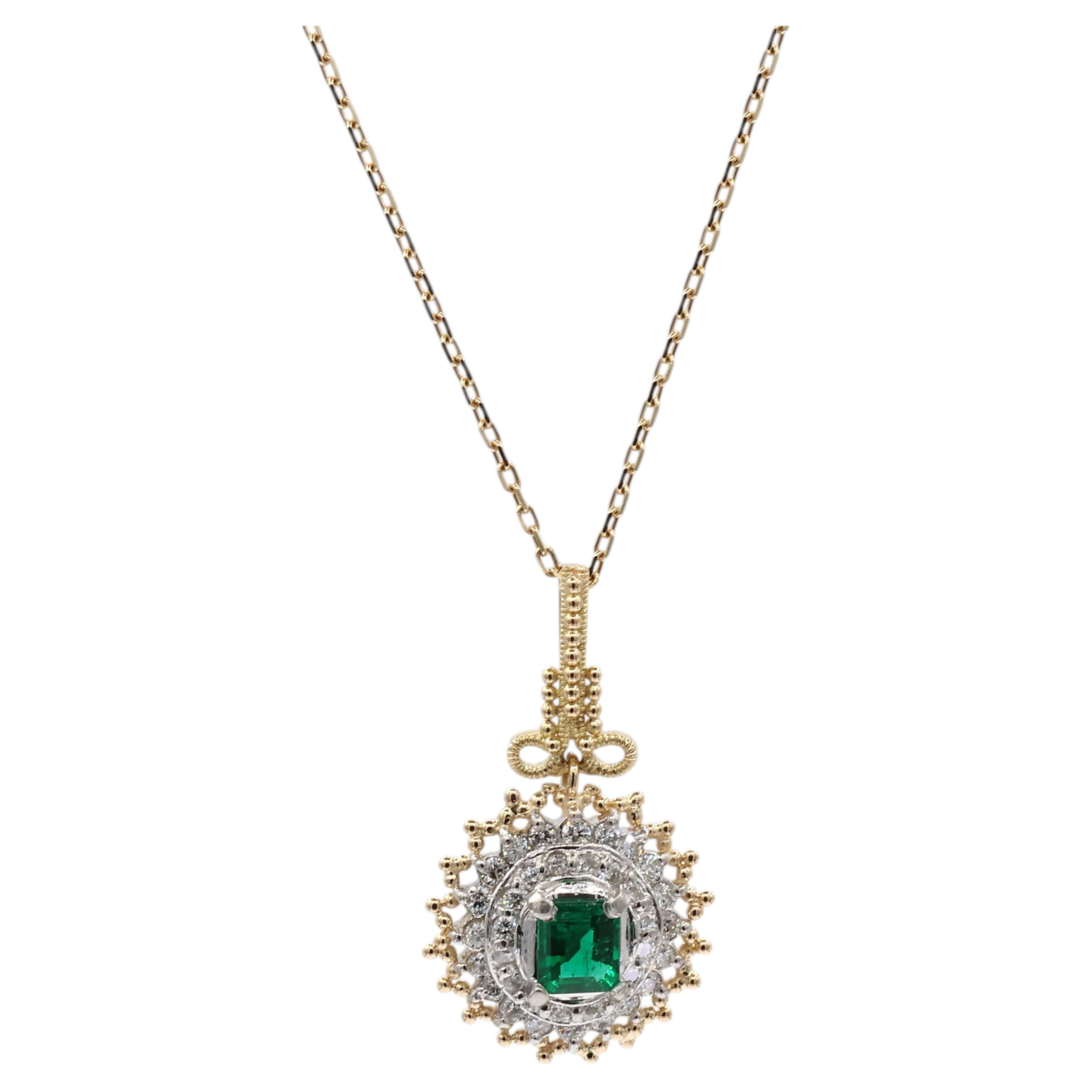 Colgante de oro amarillo macizo 18K 750 y platino 900 con diamante natural y esmeralda