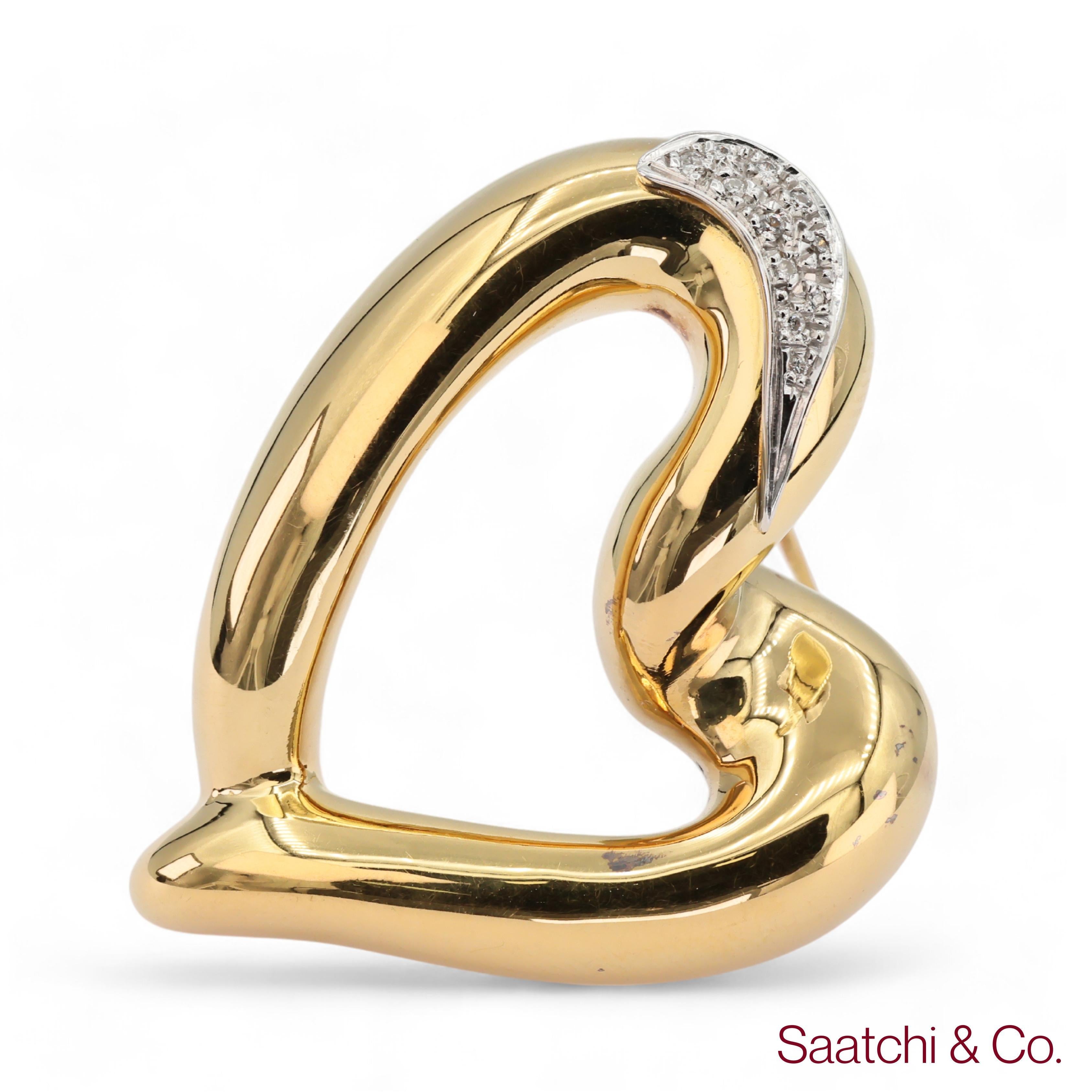 Heart Shape Pin / Brooch

Metal Type: 18K 750 Yellow Gold
Total Item Weight: 6.28 Grams
1:
Natural Diamond Weight: 0.20 Ct.
Diamond Clarity Grade: VS-SI Top Quality
Diamond Color Grade: F-G White Top Quality
Diamond Shape: Round Full Cut
No. Of
