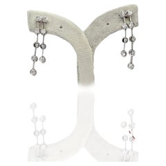 Orecchini a catena con diamanti naturali in oro bianco 18k 750