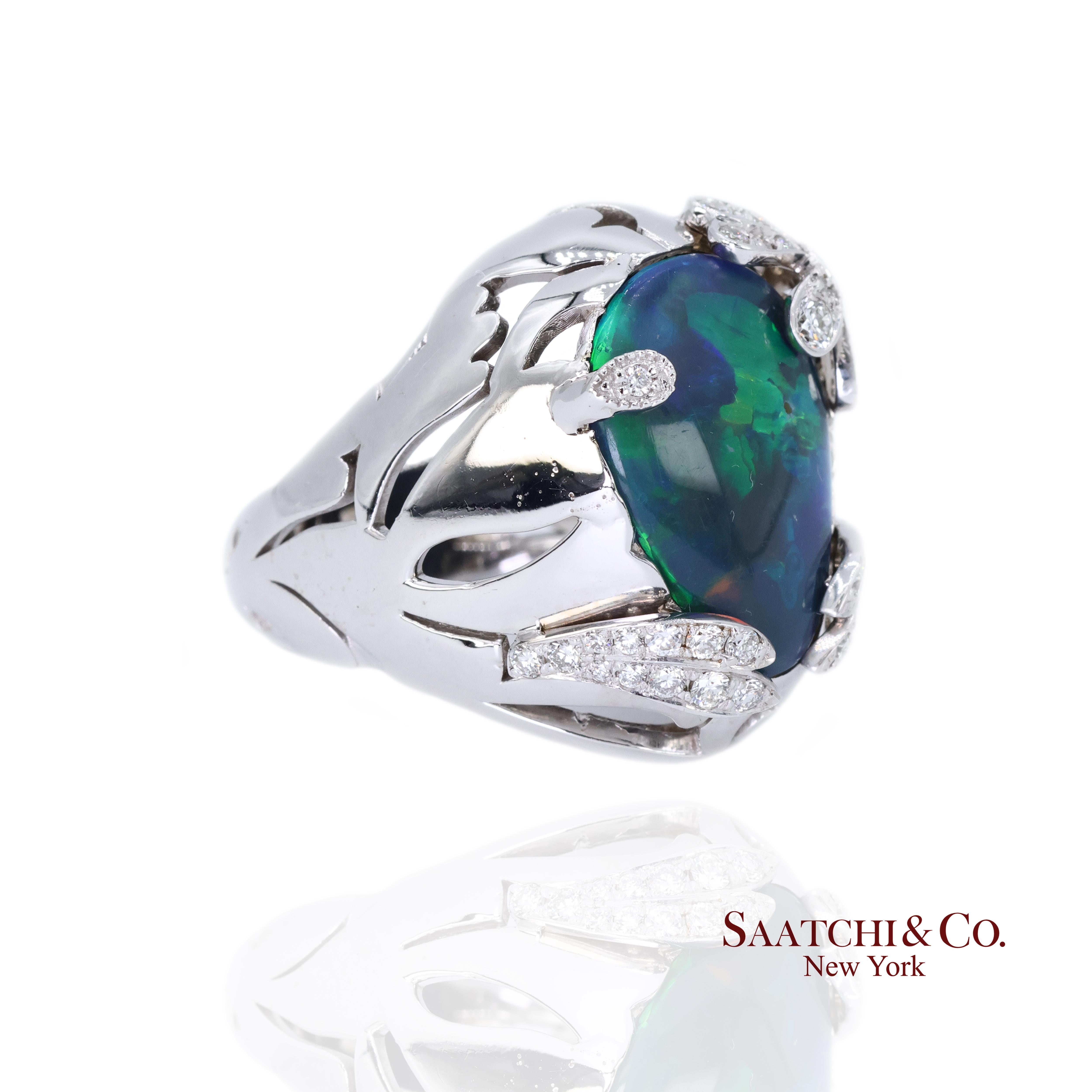 18k Weißgold Opal und Diamant Ring

Metall Typ: 18k Weißgold
Gesamtgewicht des Artikels: 14,8 Gramm
Ringgröße: 7 (veränderbar)
Abmessungen: Länge: 23,71 mm Breite: 19,62 mm Höhe: 11,7 mm
1:
Primärer Stein: Australischer Schwarzer Opal
Primäres