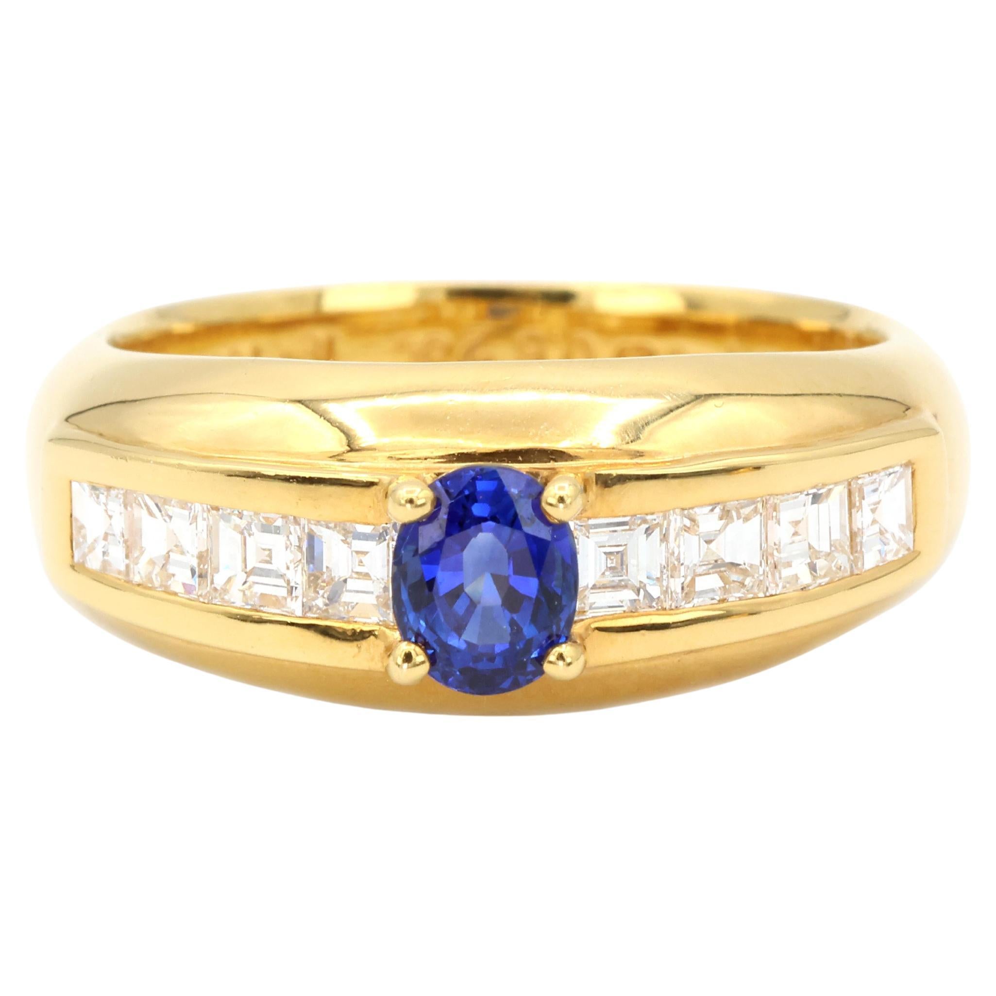 Anillo de oro amarillo 750 de 18k con zafiro azul natural y diamante natural