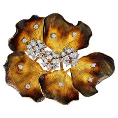 Spilla a fiore con diamante naturale in oro giallo 18k 750