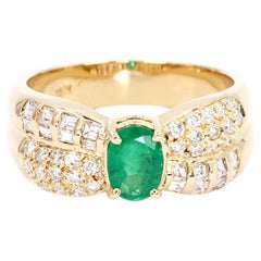 Bague en or jaune 18k 750 émeraudes naturelles et diamants