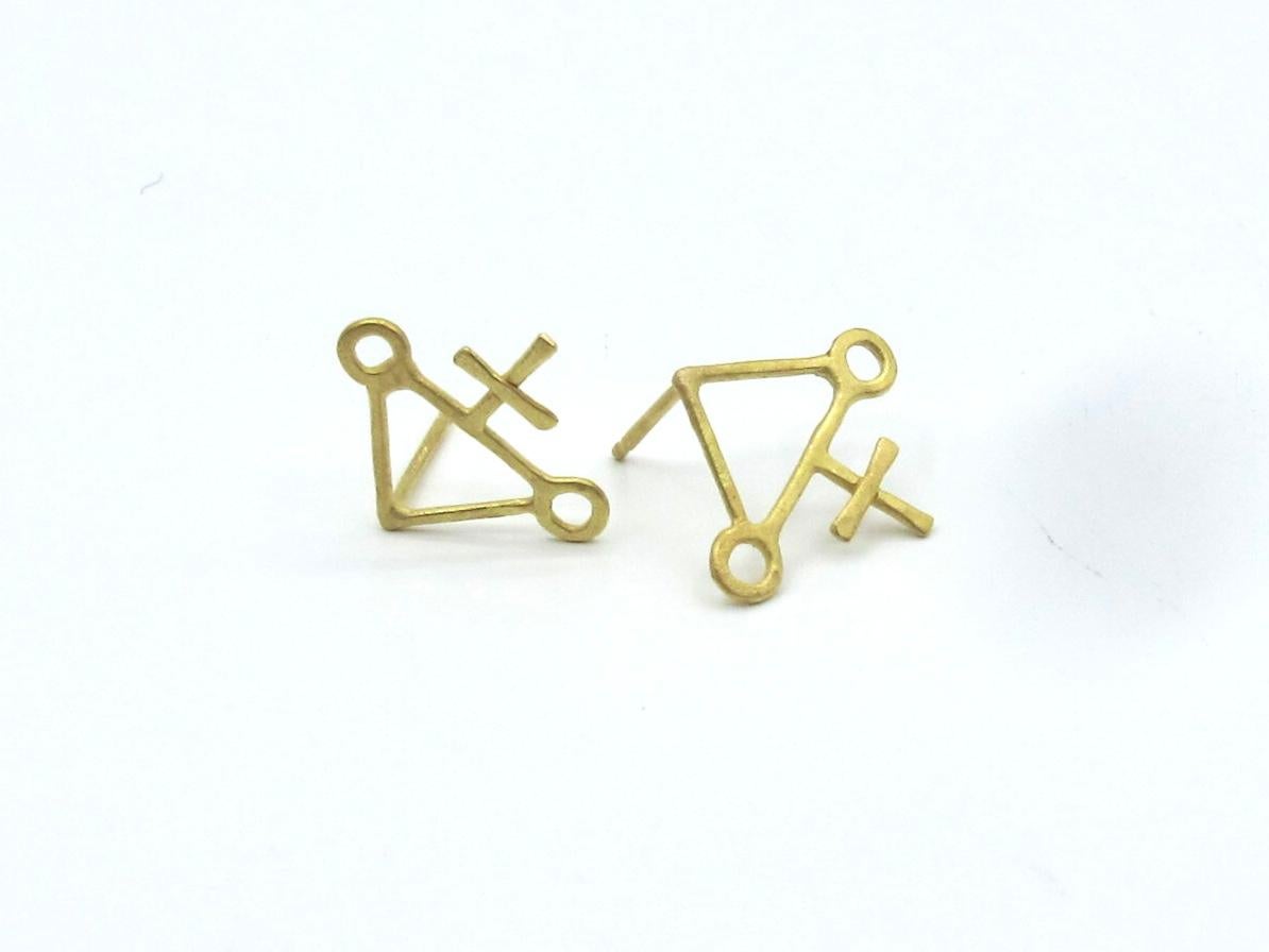 The RIMA JEWELS ALCHEMY STUD COLLECTION features a sampling of some of the symbols that populated alchemical texts from the medieval period to the renaissance. The symbols represent elements, matter, instruments, and processes among other