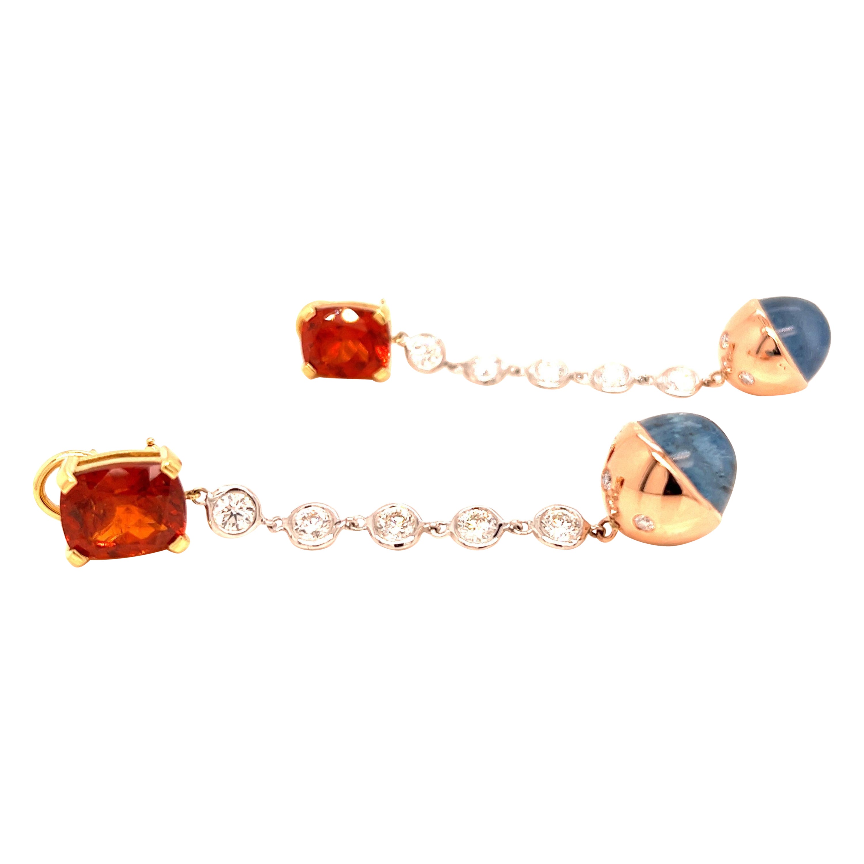 Ces étonnantes boucles d'oreilles pendantes en diamant sont un véritable chef-d'œuvre de la joaillerie fine, présentant un éventail époustouflant de pierres précieuses qui ne manqueront pas de faire tourner les têtes. Les boucles d'oreilles sont