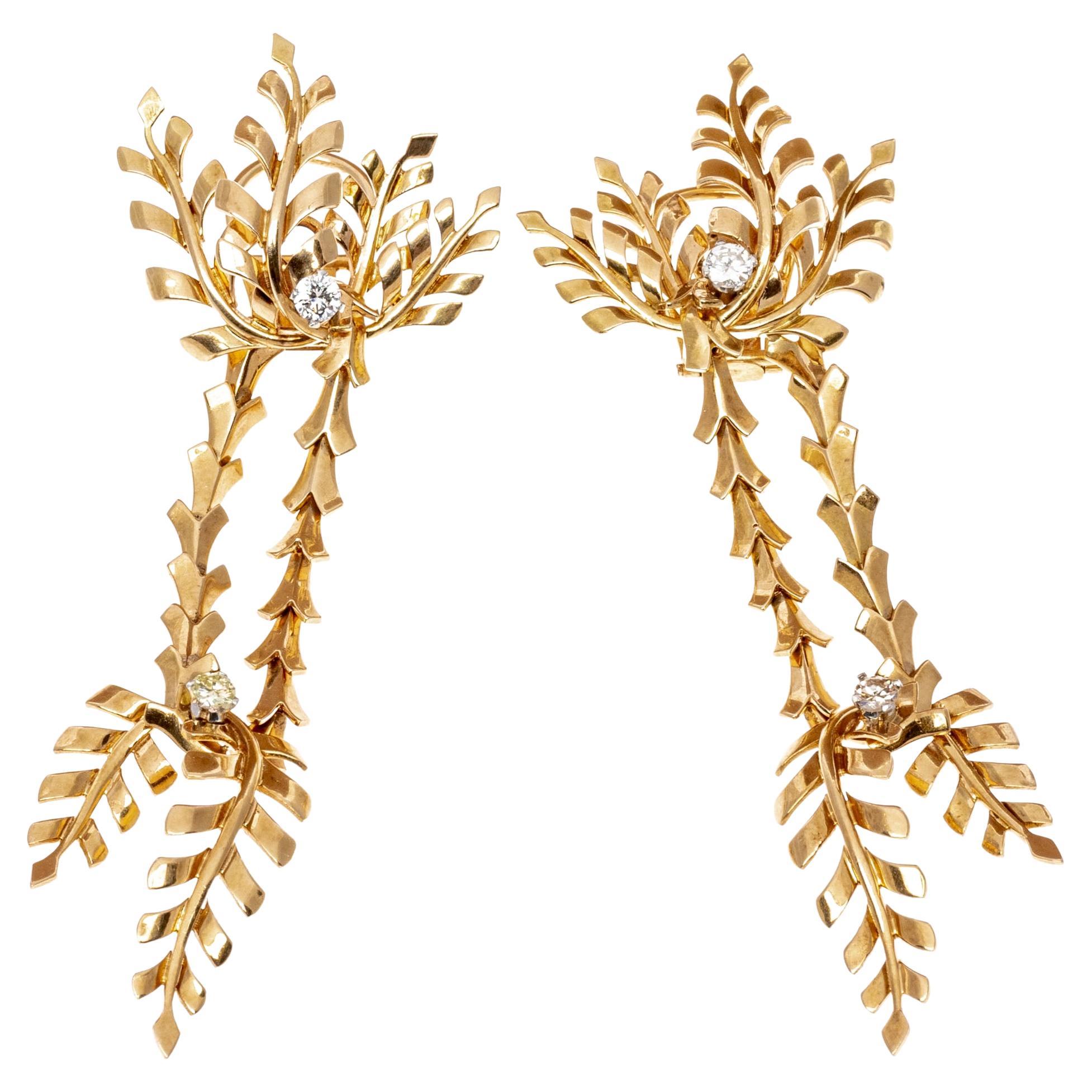 Boucles d'oreilles feuilles articulées 18K et diamants