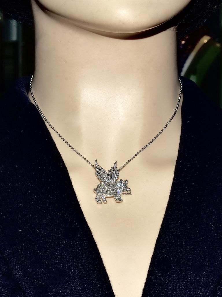 18K white gold and fine diamond pendant/pin. If Pigs could fly or when pigs fly is a humorous way of saying that what is being said or hinted at will never happen. The flying pig can be traced back to Greek Mythology which references a winged boar