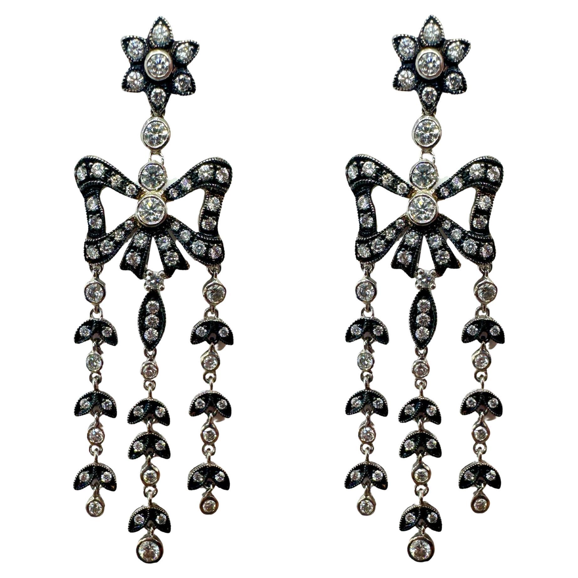 Pendientes de diamantes de 18 quilates y plata