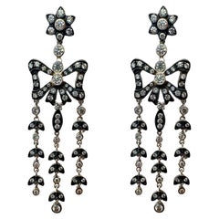 Pendientes de diamantes de 18 quilates y plata