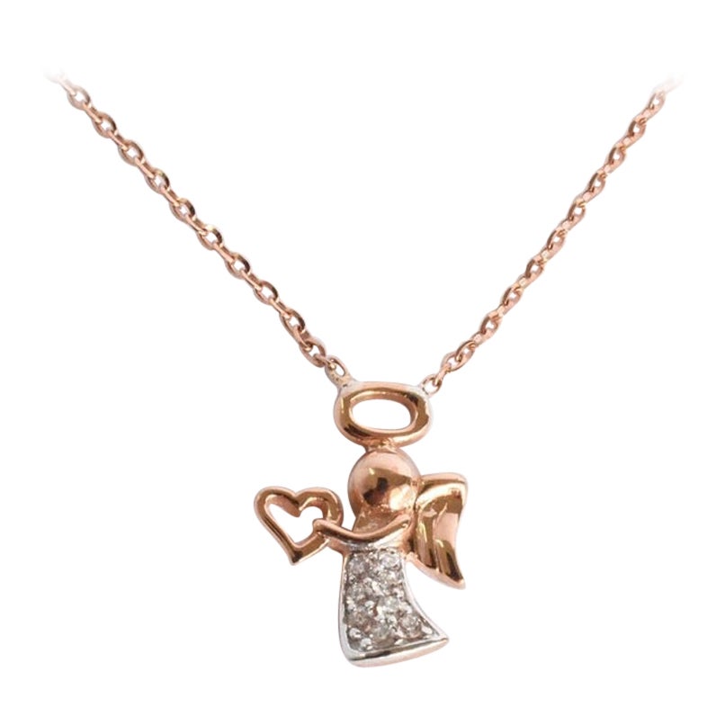 14k Gold Angel Charm Pendent Necklace with 0.05 Ctw. Diamond For Sale