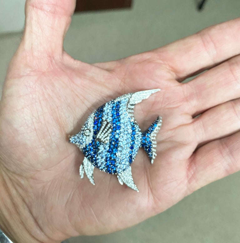 18k Angel Fish brooch with 1.13 carats of diamonds and 9.81 carats of fine blue sapphires. 6.54 grams, 2