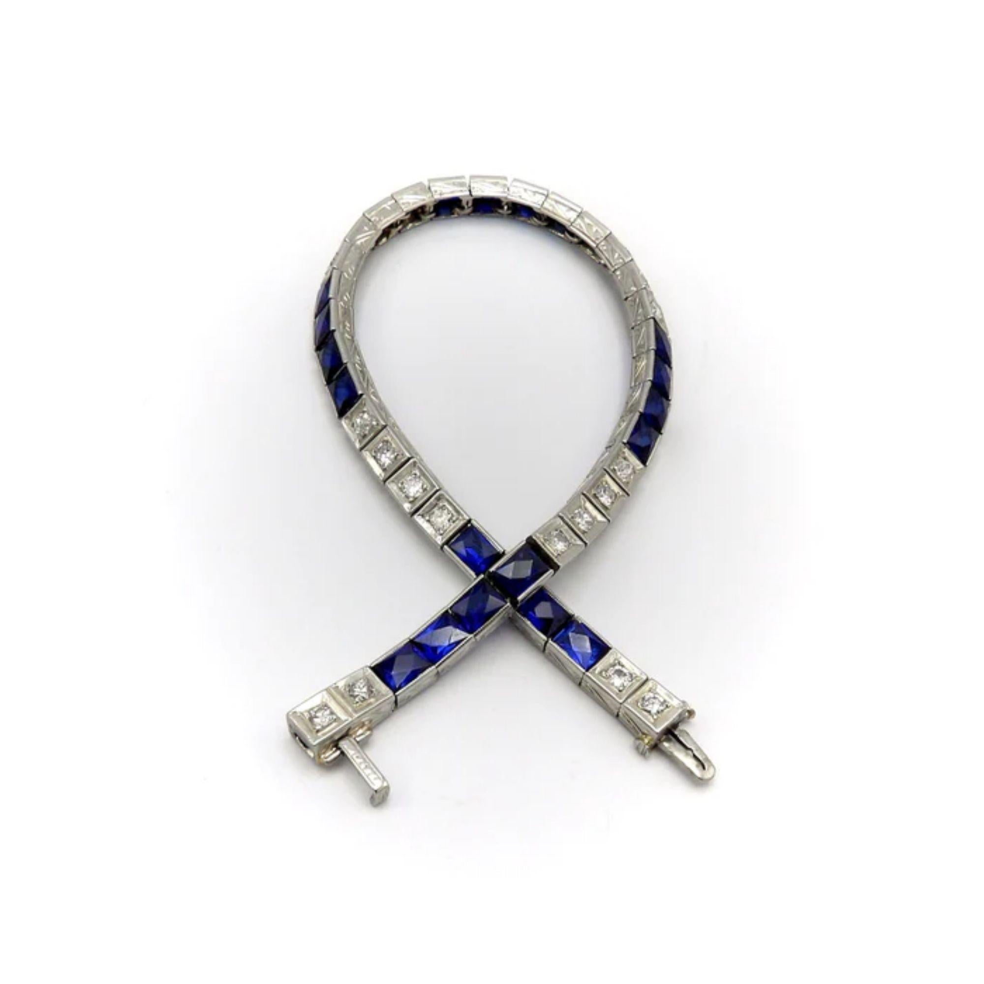 A classic line bracelet from the Art Deco era. Made of 18K white gold, this stunning piece features an alternating pattern of sparkling diamonds and synthetic deep blue sapphires.

Each of the 20 diamonds is micro prong set within an individual box
