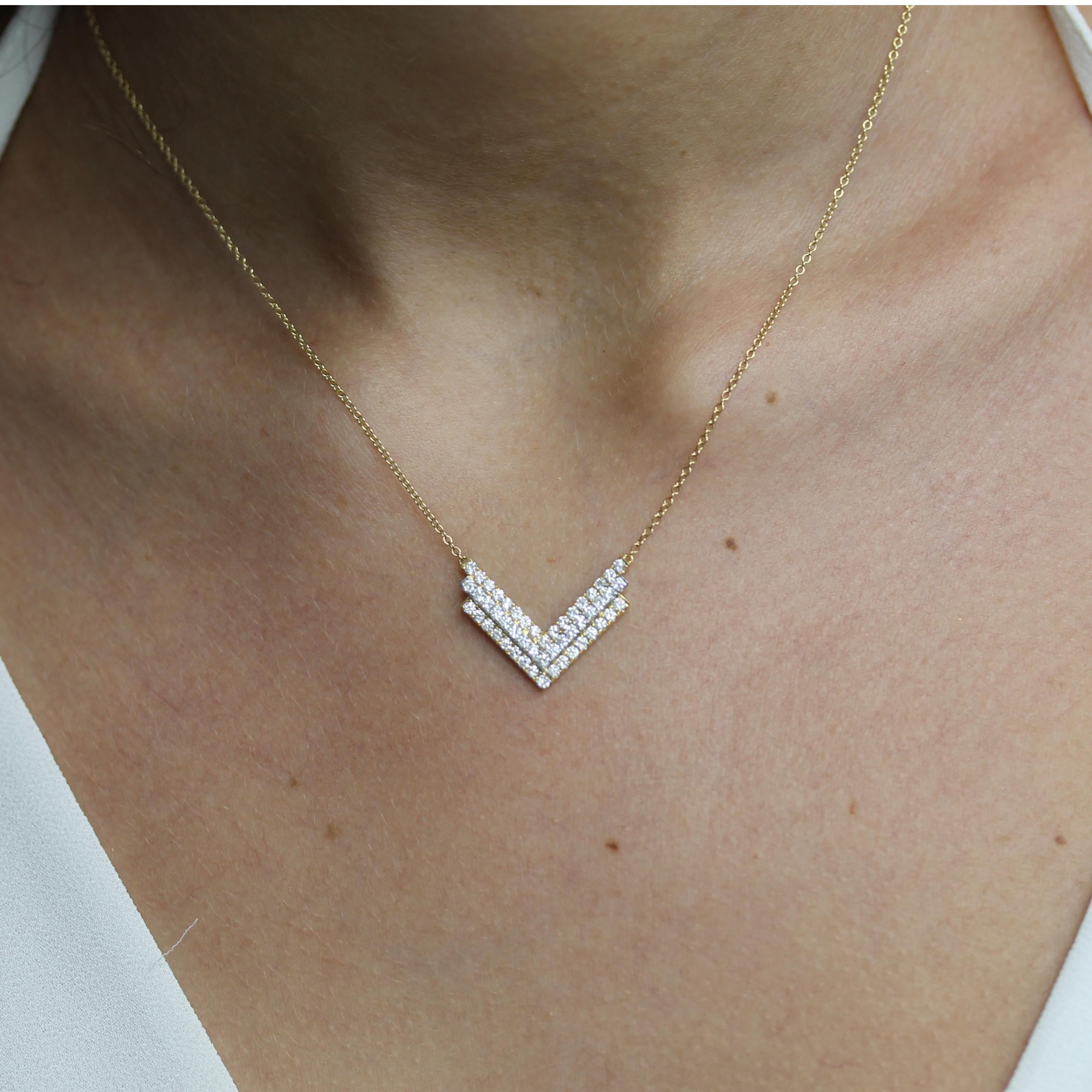 18K Two-Tone Art-Deco Style Chevron Necklace, featuring (3) rows of diamonds, set in white and yellow gold. 18K 18-inch Cable Chain, with adjuster at 16-inch. Perfect necklace for layering. Item ref. N8654.

Stone Information:
- 51 diamonds totaling