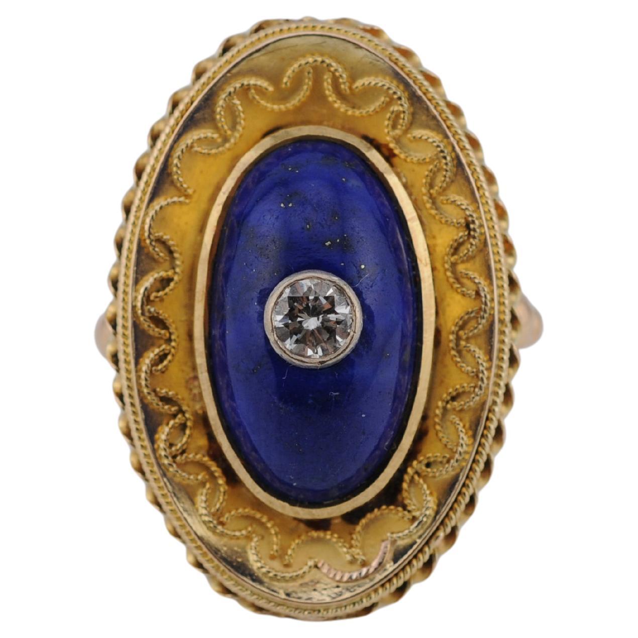 18K Art Nouveau Ring with Lapis Lazuli Cabochon and Old-Cut Diamond

An elegant Art Nouveau ring crafted from 18K gold, featuring a rich lapis lazuli cabochon and a brilliant old-cut diamond set in intricate, filigree detailing.

Diamond