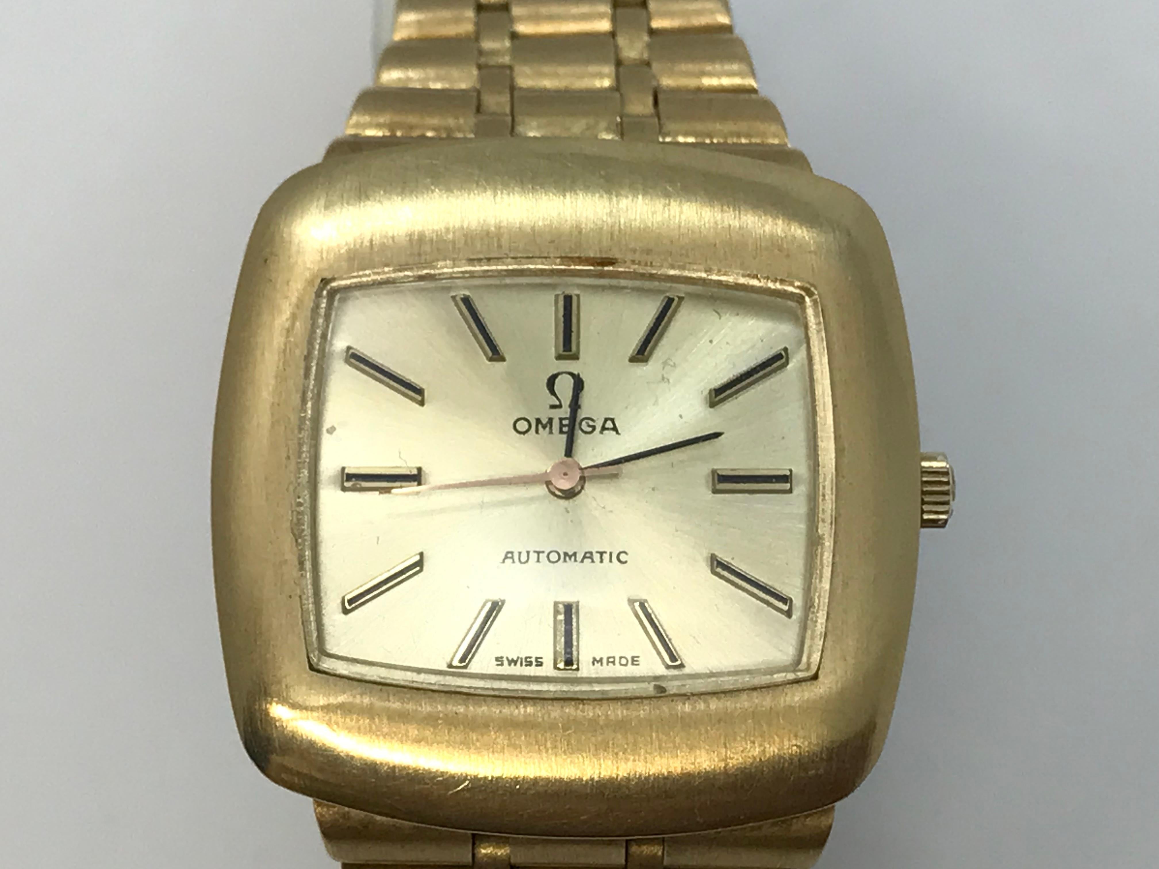 Vintage 18k Solid Gold Automatic Omega Lady Watch and Bracelet with Swiss Omega Watch Co. movement, 24 Jewels, marked on the dial and on the back case, will fit to a 7.5 inches wrist, 
Very good condition and running. Weighs about 88.2 gr. no box.