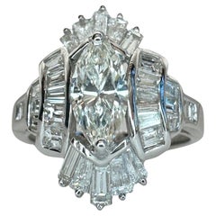 Bague navette 18 carats avec diamants taille baguette et marquise