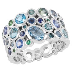 Anello a cascata verde acqua su misura 18k
