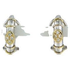 Clip-Ohrringe aus 18-karätigem Bicolor-Gold mit Brillanten im Brillantschliff (0,08 Karat)