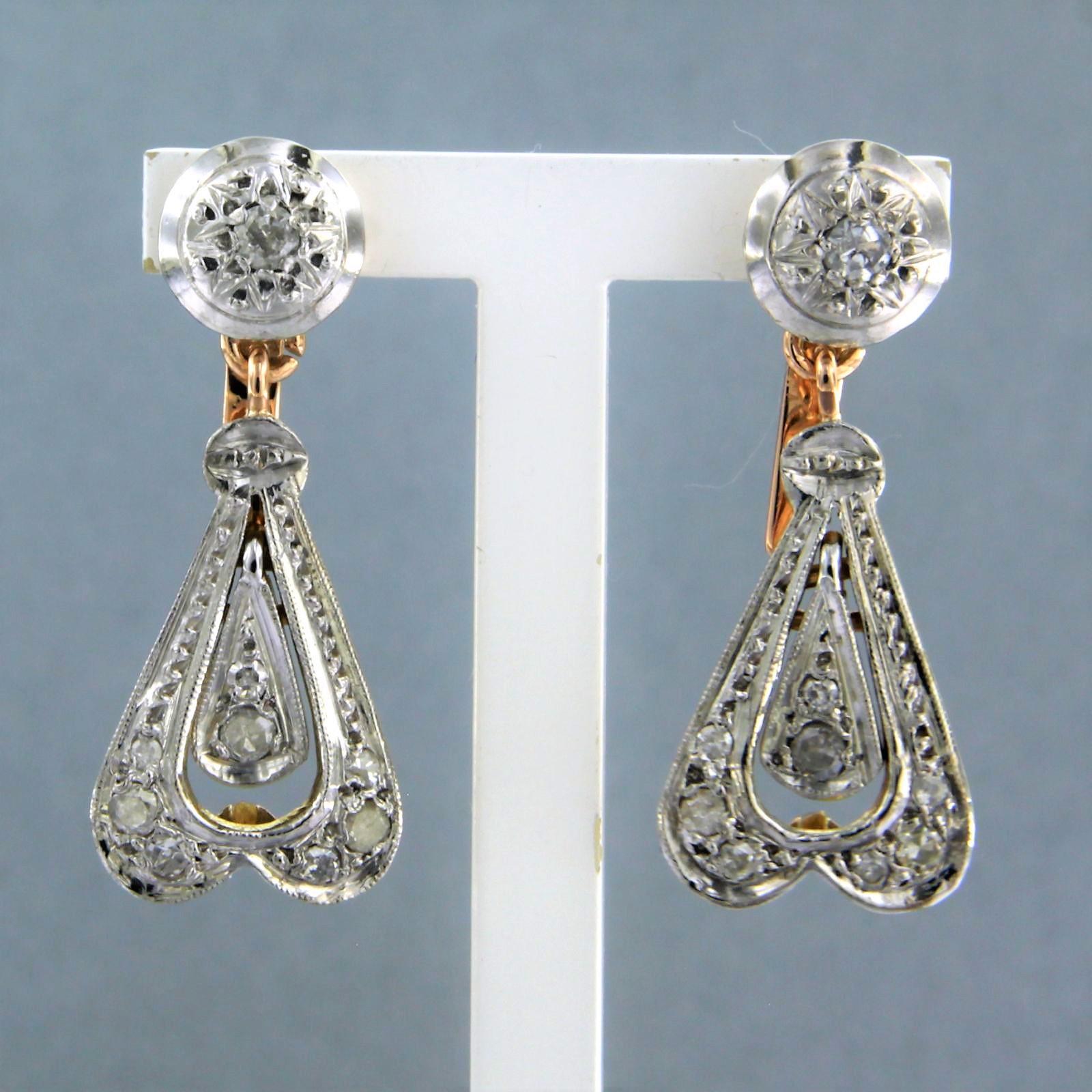 18k bicolour gold earrings set with single cut diamond up to 0.40ct - F/G - SI/P 

Detailed description

the size of the earring is 2.8 cm high and 1.2 cm wide

Total weight: 7.5 grams

set with:

- 18 x 1.3 mm - 2.0 mm single cut diamond, total
