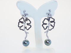 Boucles d'oreilles en or noir 18 carats perle de Tahiti noire verdâtre 10,7 mm et diamant 1,99 carats