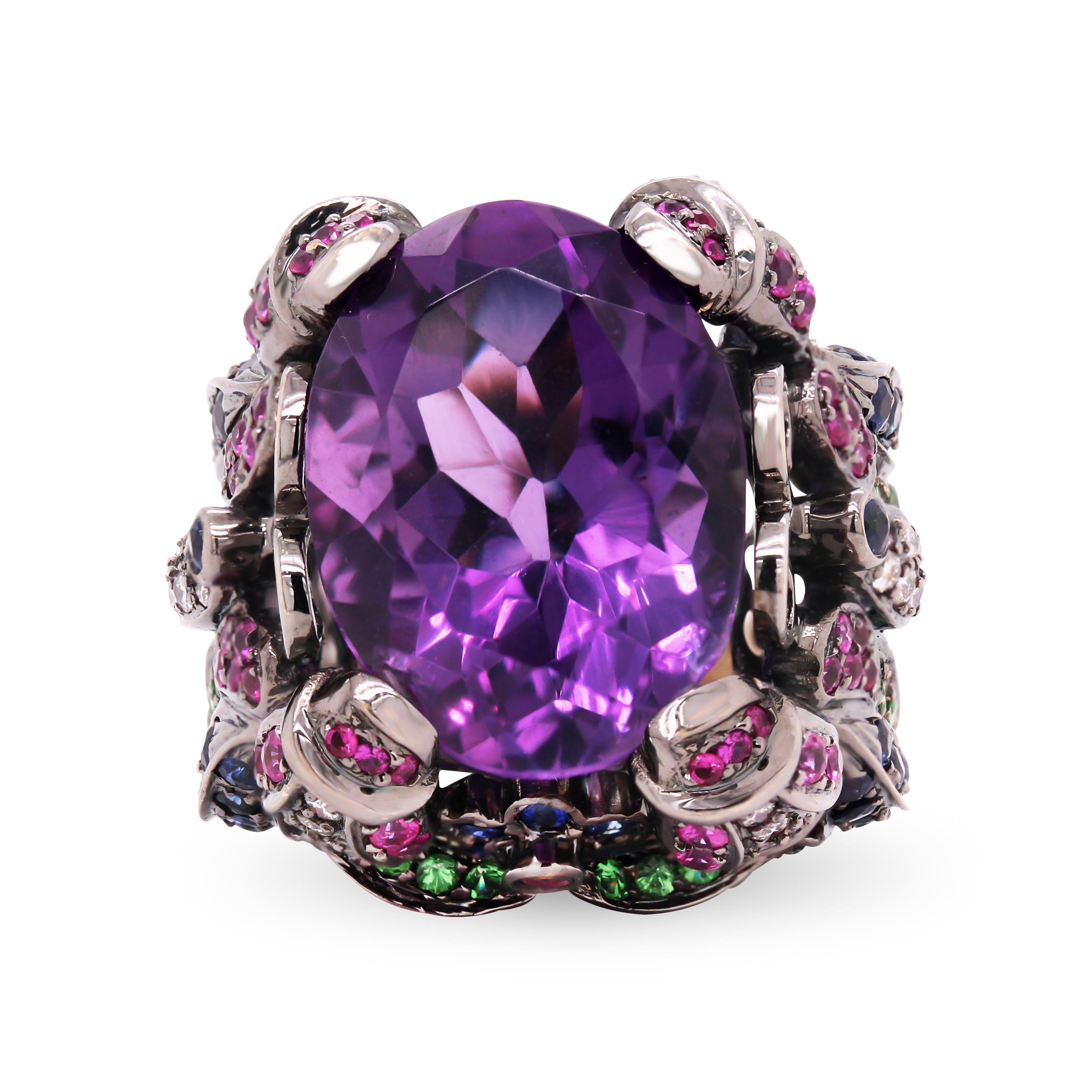 18K Black Gold Oval Amethyst Multi Color Sapphire Floral Motif Cocktail Ring

This gorgeous ring features an oval-cut Amethyst center and has green, blue, pink, white sapphires set all throughout.

Center Amethyst is apprx. 20 carats. 

25mm face