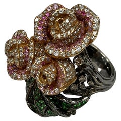 Anello in rodio nero e oro rosa 18 carati con zaffiro rosa e ametista e diamante