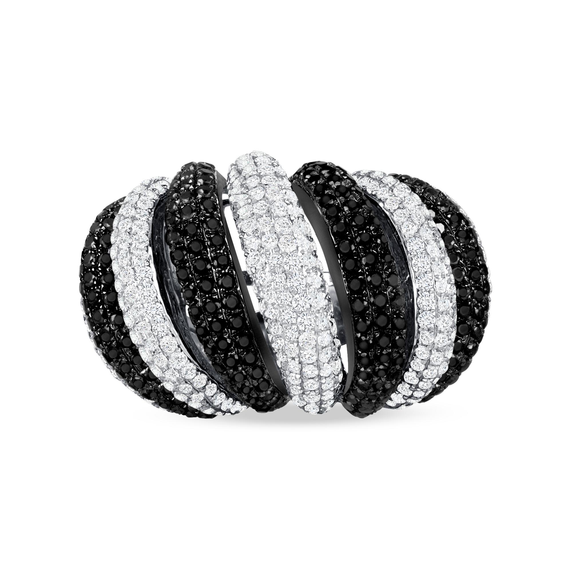 18K Black & White Genuine Diamond Ring 
White Diamonds = 2.27 carats with 388 stones. 
Black Diamonds = 2.76 carats with 354 stones. 
Dome shape & Round Cut
Total Gold Weight: 15.9 Grams 