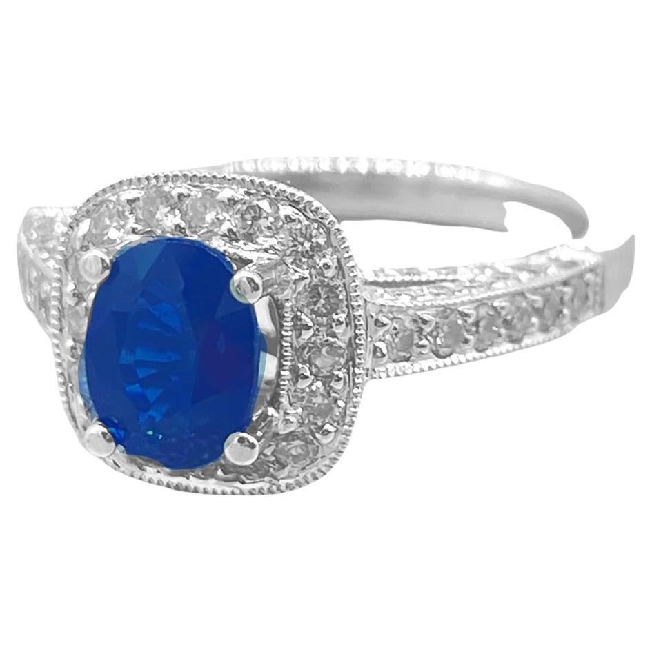 18K Blue Sapphire and Diamond Halo Ring 2.20 Carat Total For Sale