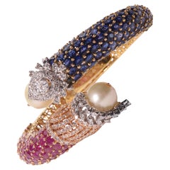 Armband aus 18 Karat Blauem Saphir und Rubinen