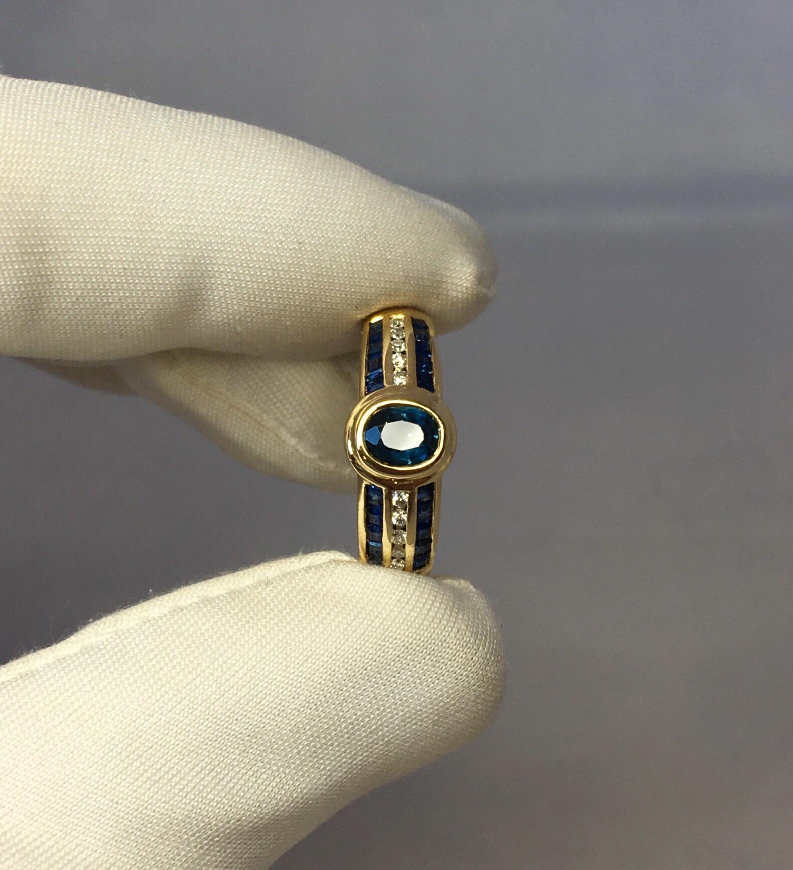 Oval Cut 18k Blue Sapphire & Diamond Designer Ring 1 Carat Yellow Gold Rubover Bezel Set