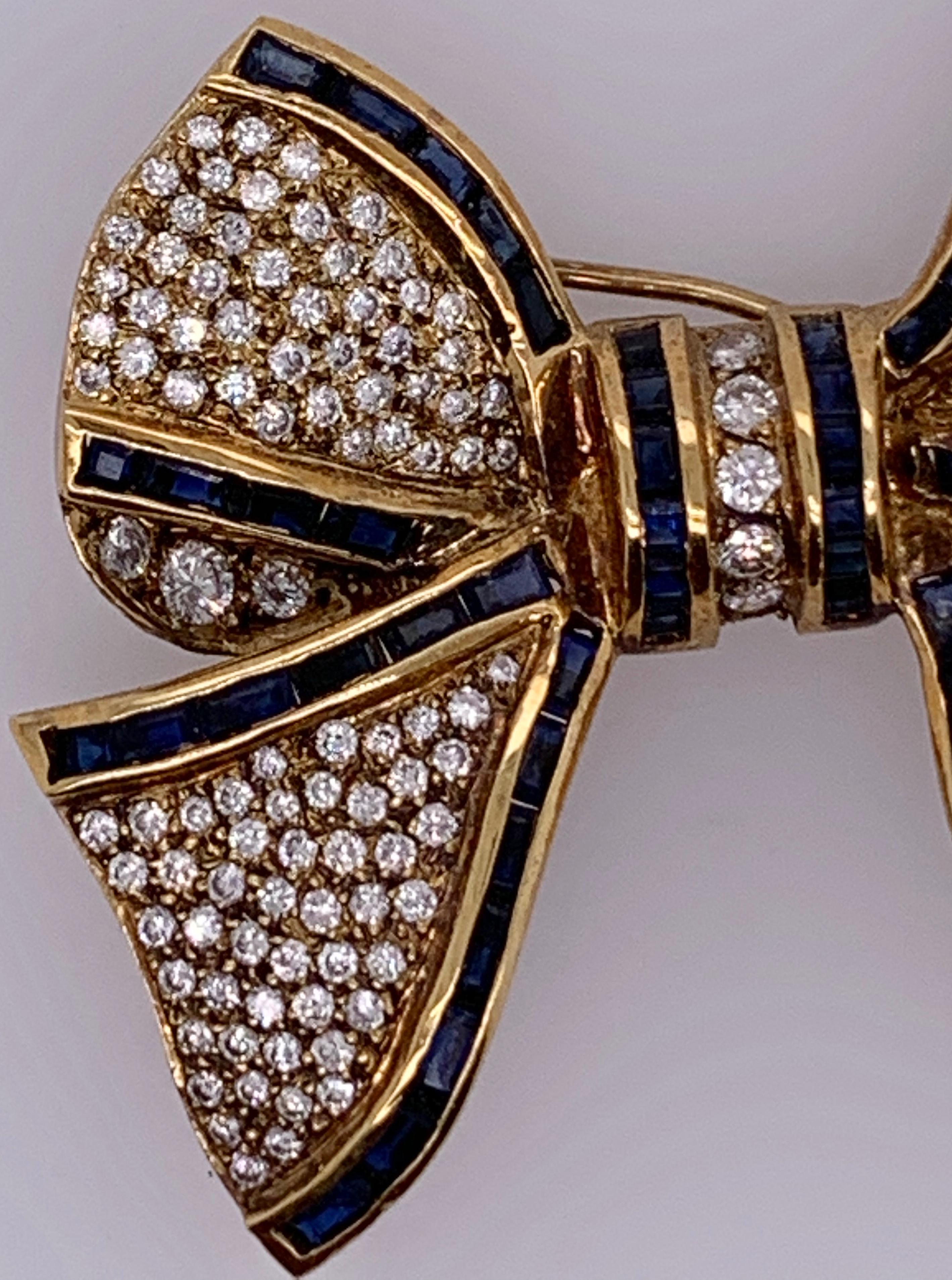 Art Deco 18 Karat Bow Brooch Pin Diamonds and Sapphires Designed in Yellow Gold