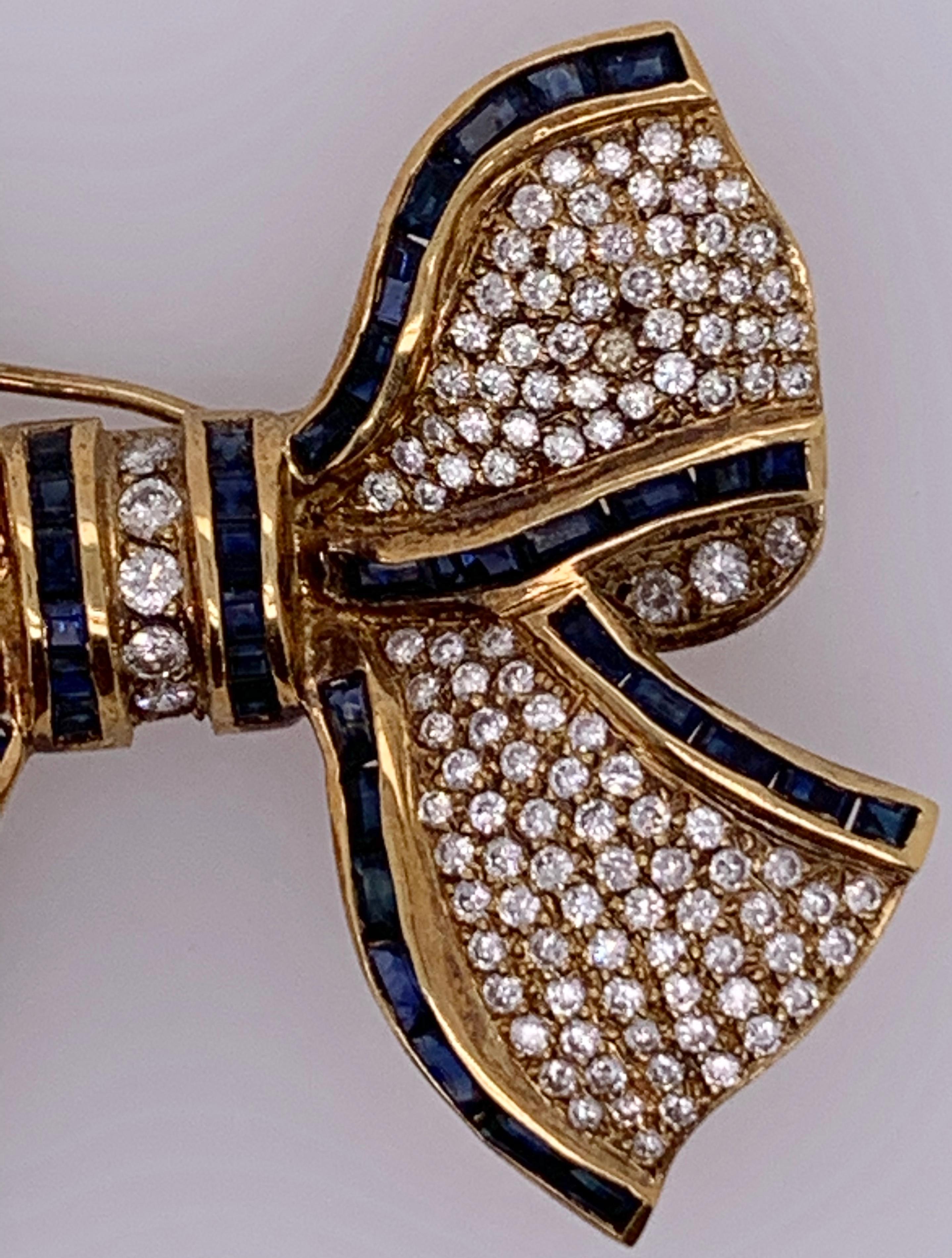 18 Karat Bow Brooch Pin Diamonds and Sapphires Designed in Yellow Gold In Good Condition In Stamford, CT