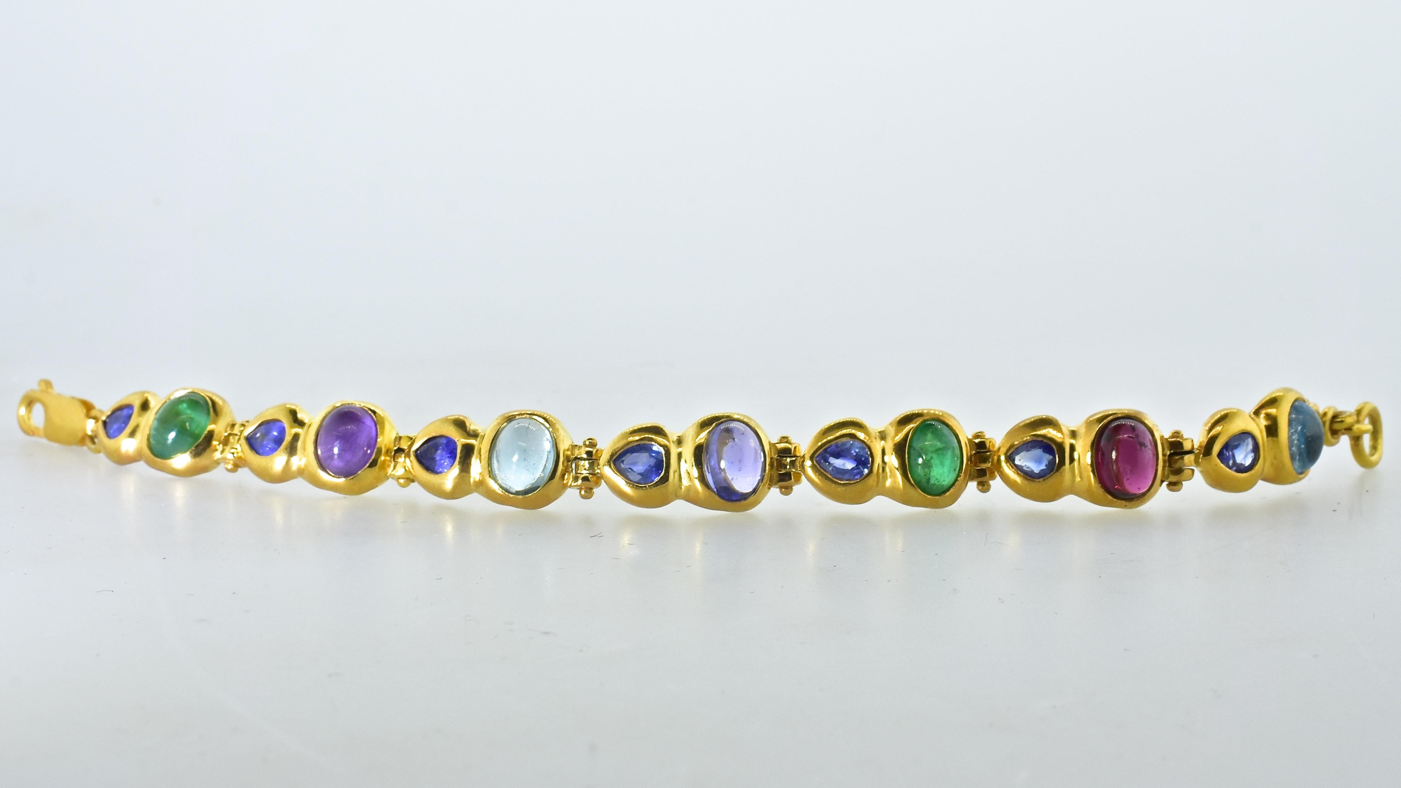 18k Bracelet with Sapphire, Emerald, Garnet, Aquamarine, Amethyst and Tanzanite In Excellent Condition In Aspen, CO