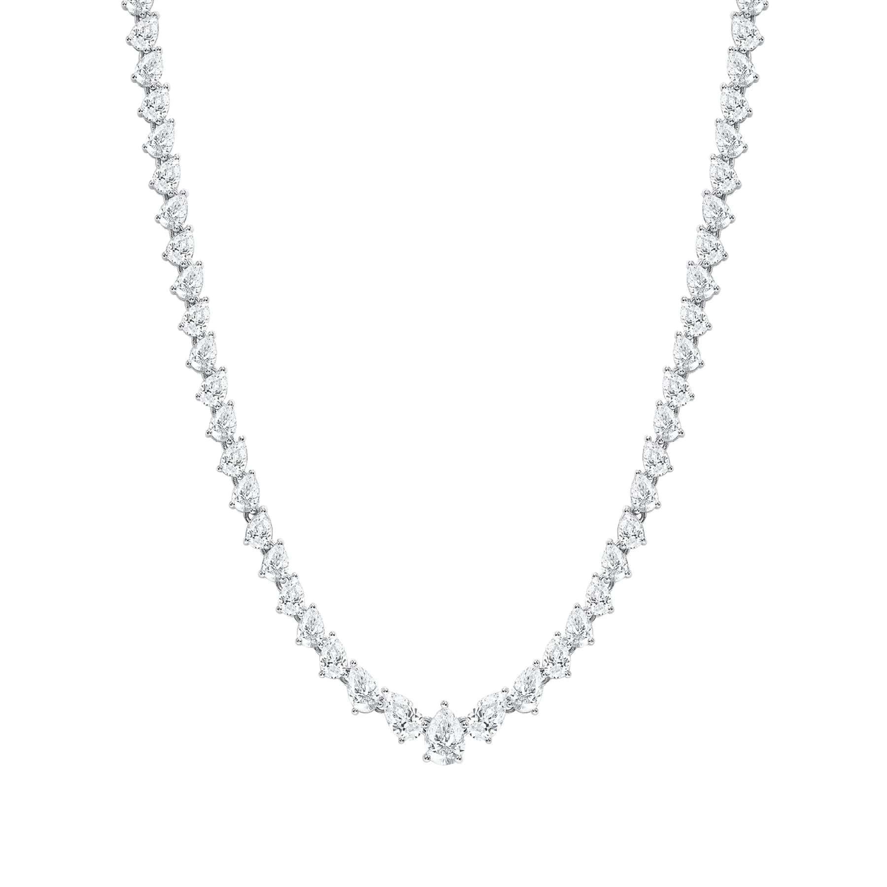 This diamond tennis necklace features beautifully cut pear diamonds set gorgeously in 18k gold

Necklace Information 
Metal : 18k Gold
Diamond Cut : Round Natural Conflict Free Diamond 
Total Diamond Carats : 0.50ct
Diamond Clarity : VS -SI
Diamond