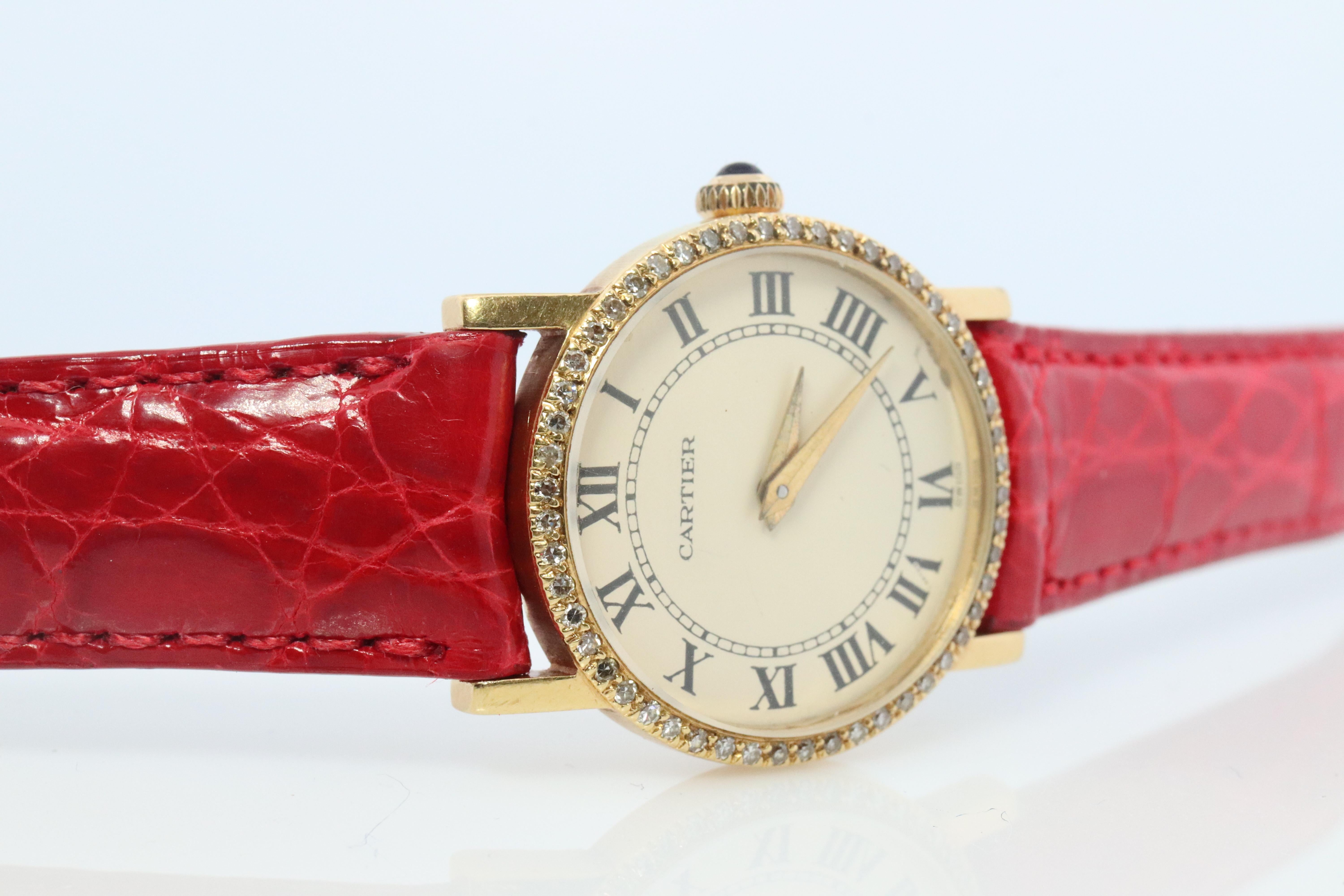 18k Cartier Diamantuhr. 18k YG Cartier x Baume Mercier Runde Damenuhr. (Cabochon)