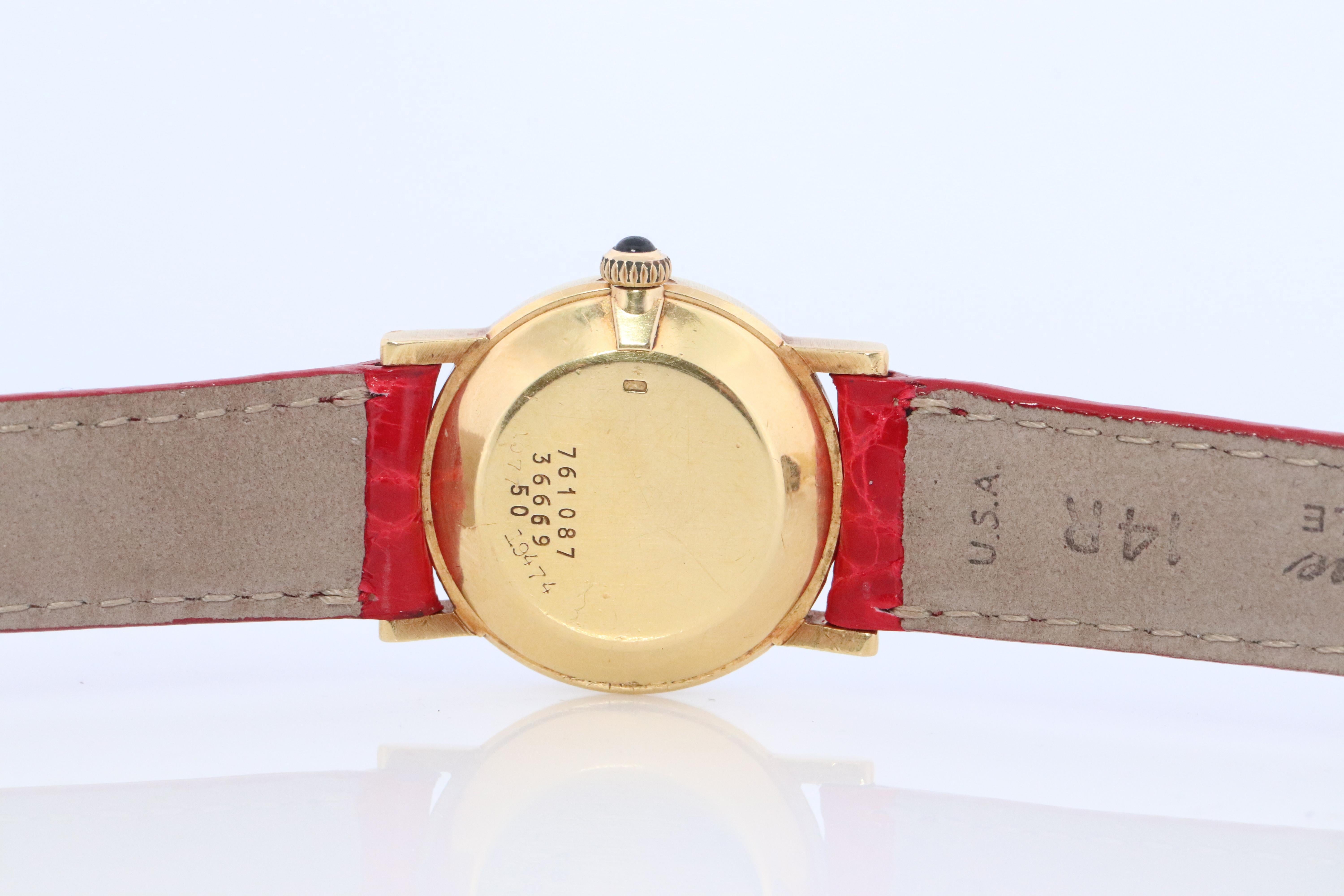 18k Cartier Diamantuhr. 18k YG Cartier x Baume Mercier Runde Damenuhr. 1