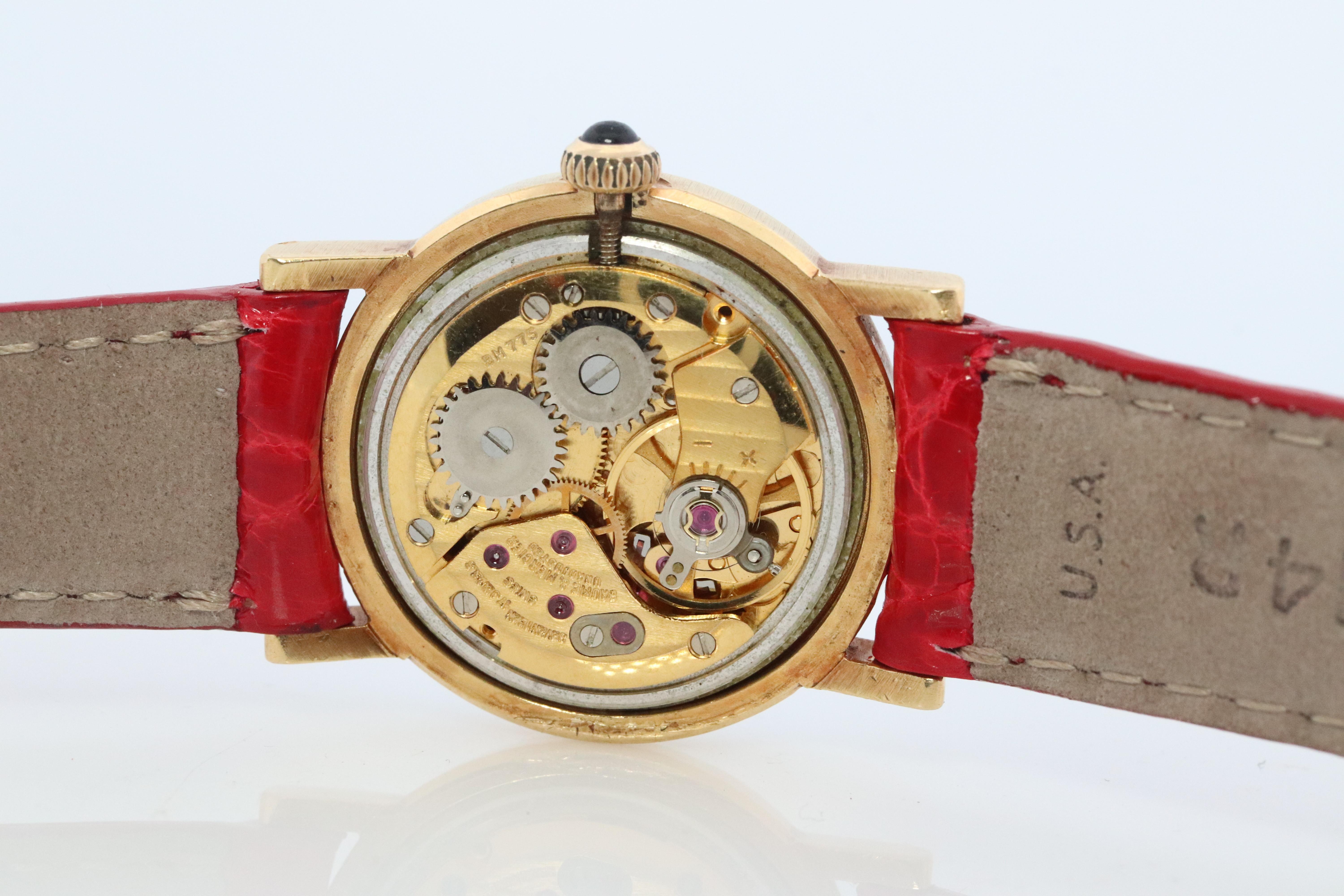 18k Cartier Diamantuhr. 18k YG Cartier x Baume Mercier Runde Damenuhr. 2