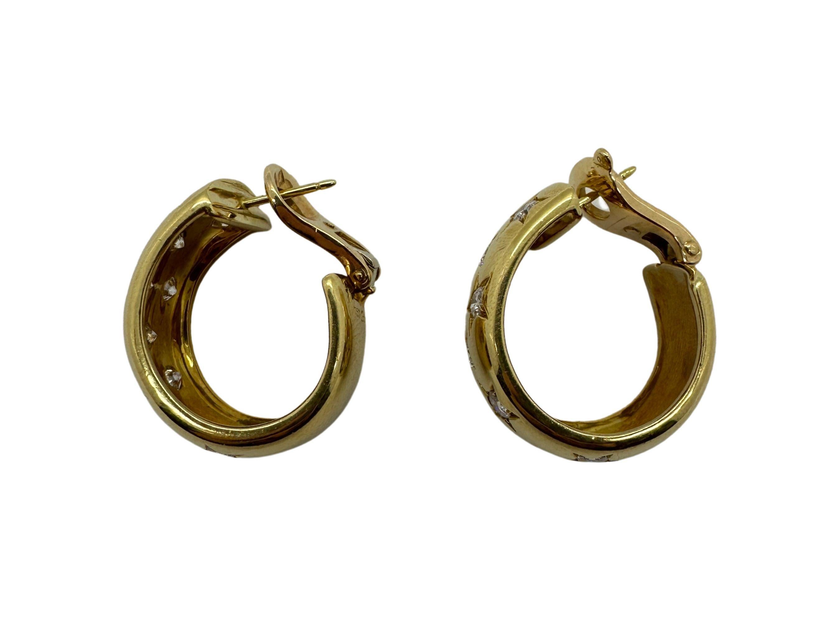 18k Cartier Estate Gold and Diamond Hoops with Star Motif. In Good Condition For Sale In New York, NY