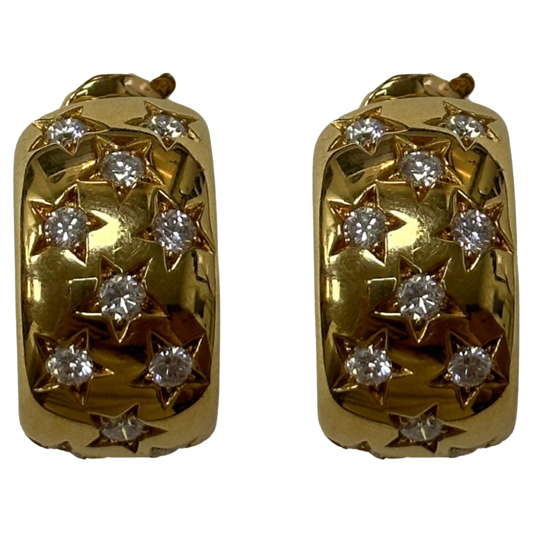 18 Karat Cartier Estate Gold- und Diamant-Creolen mit Sternmotiv aus Gold. im Angebot