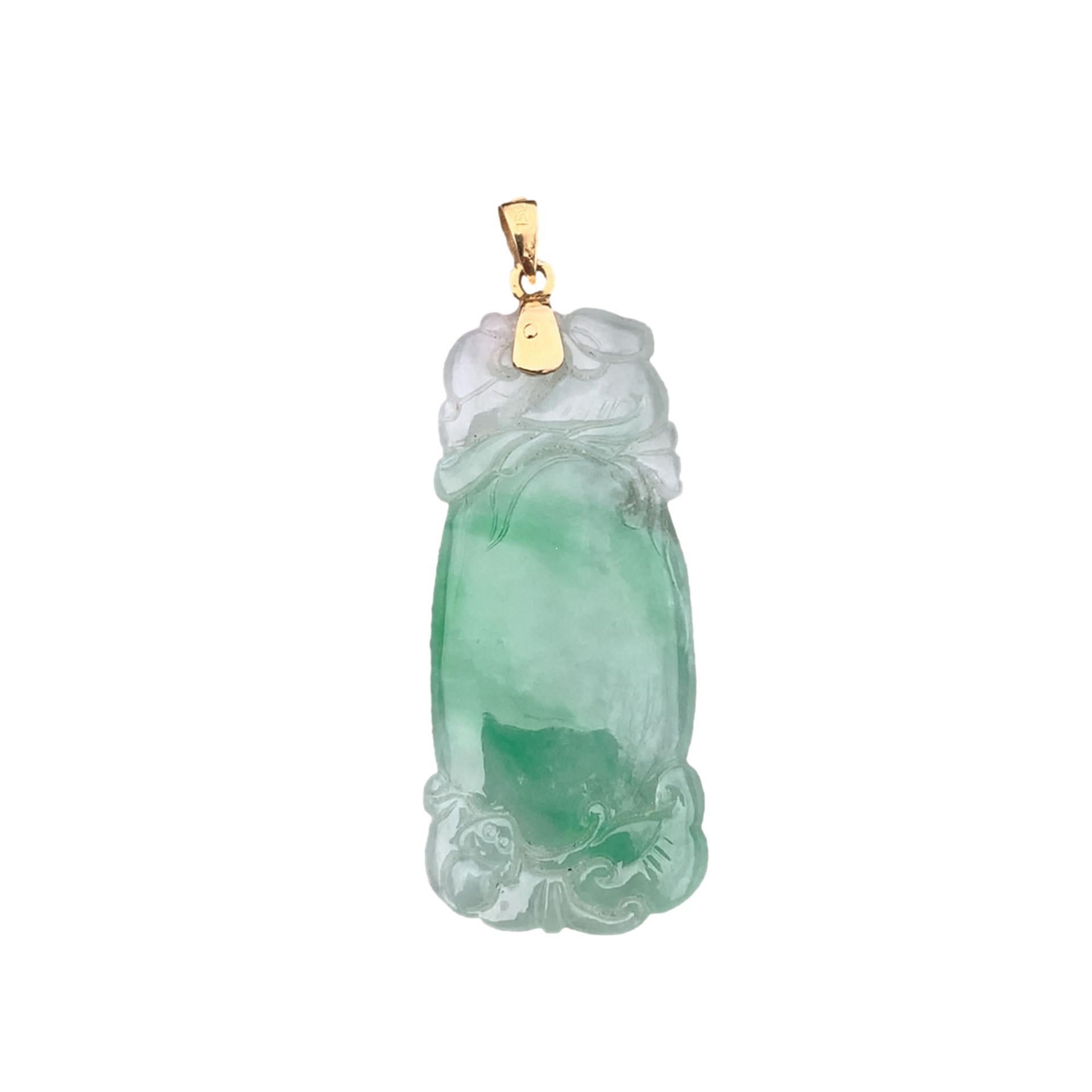 18K yellow gold carved jade pendant with Mason Kay report stating natural jadeite grade A jade, not dyed. The jade measures 17mm x 39mm with bail creates a pendant that measures 1 7/8