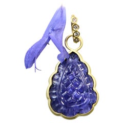 18k enhancer, carved Tanzanite, with Diamond bail