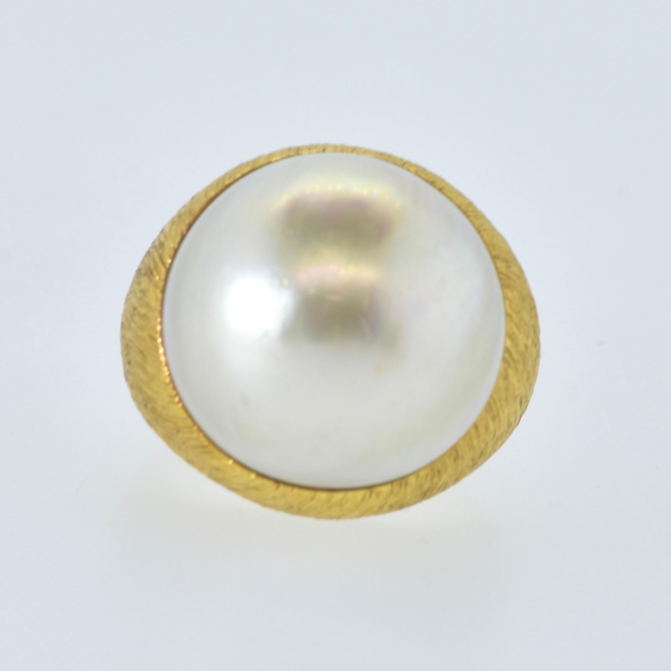 Women's or Men's 18K centering a Very Fine Large over 19 mm Mabe Cultured Pearl Ring  circa 1960.
