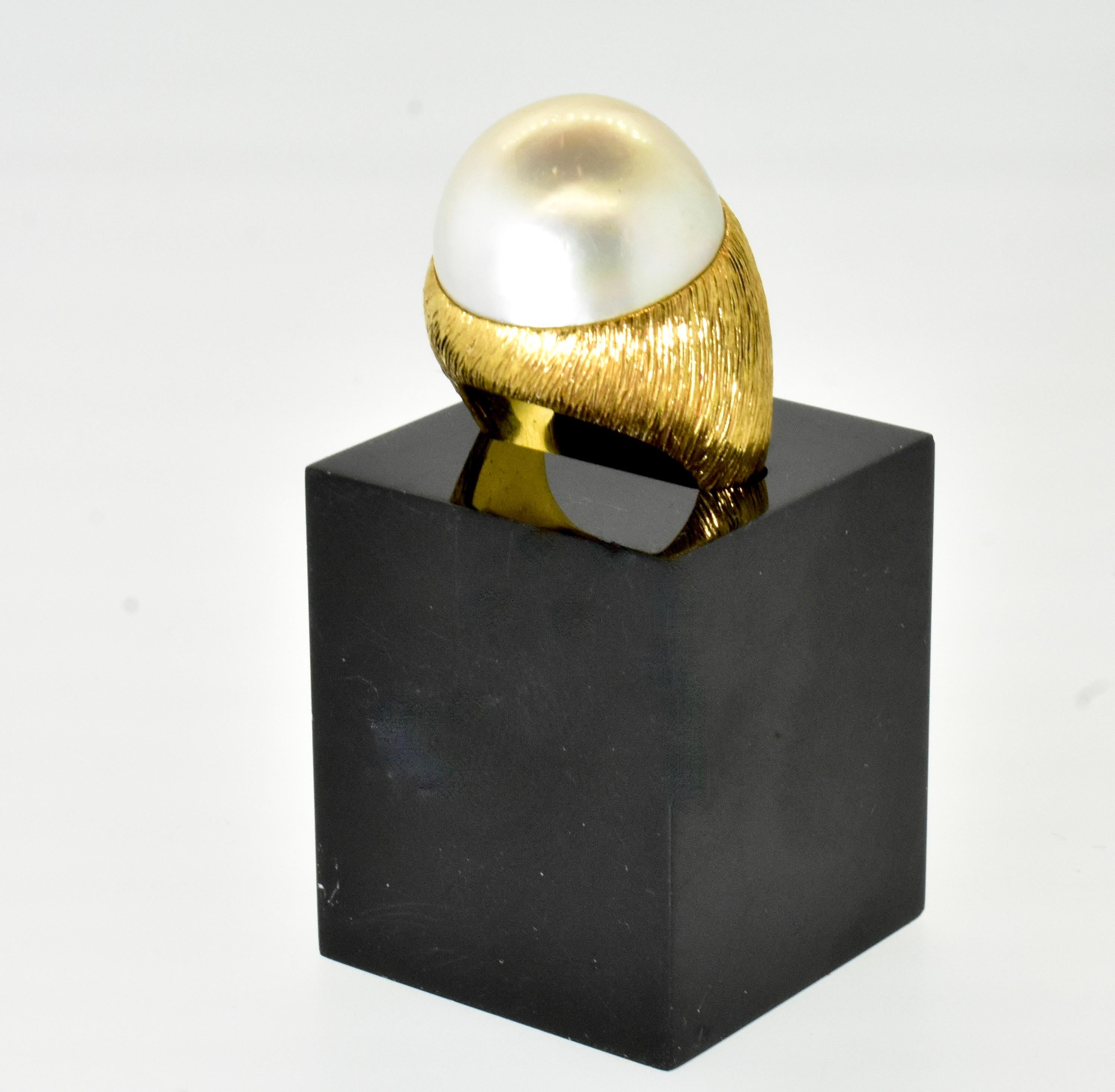 18K centering a Very Fine Large over 19 mm Mabe Cultured Pearl Ring  circa 1960. 2