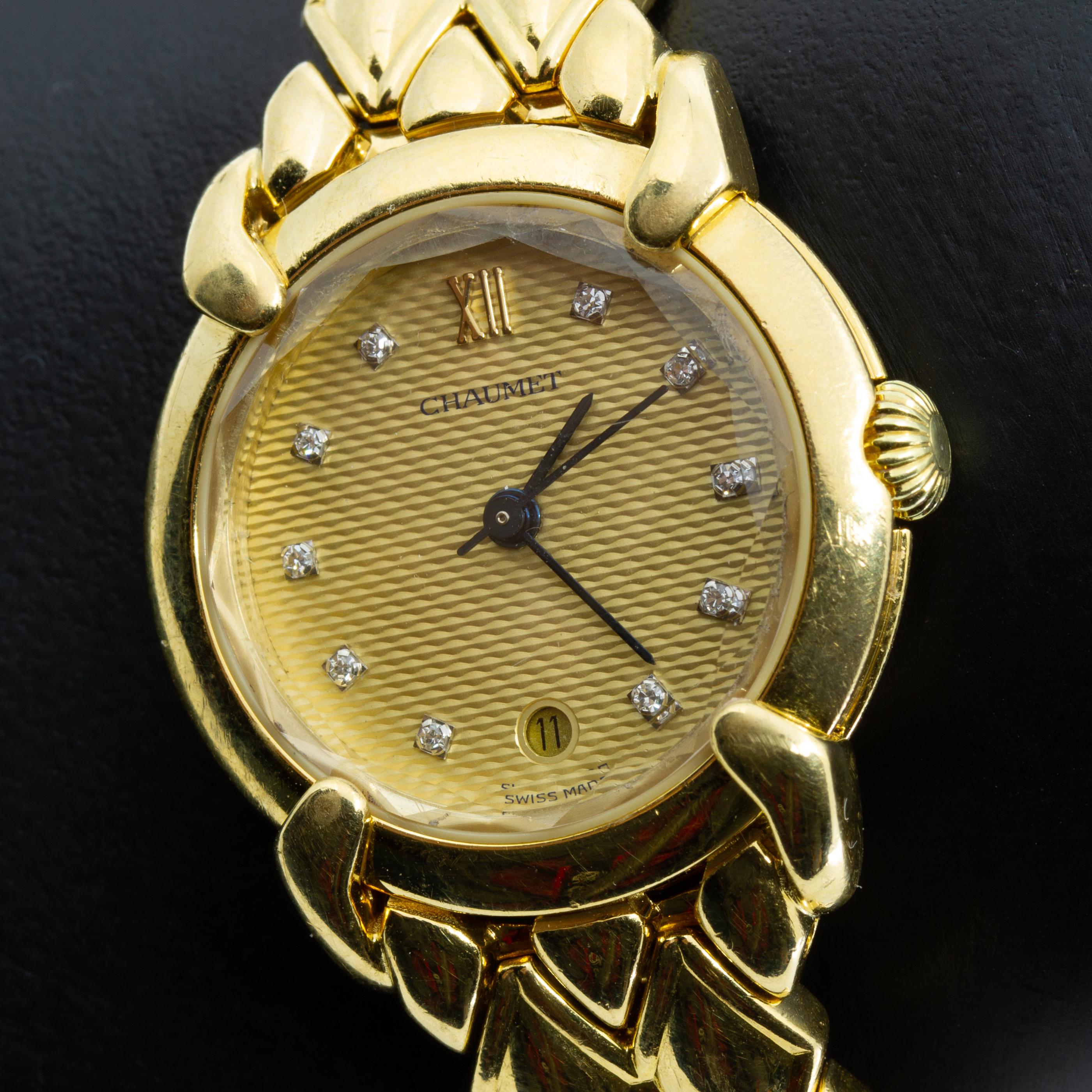 Offered is a Chaumet Diamond wristwatch, 18k 60.4dwt 
Champagne Guilloche Dial with Diamond Hour Markers, Date Indicator, Second Hand, and Sapphire Crystal.Matching 18K Yellow Gold Chaumet Bracelet with Hidden Clasp. 
Quartz Accuracy Movement.