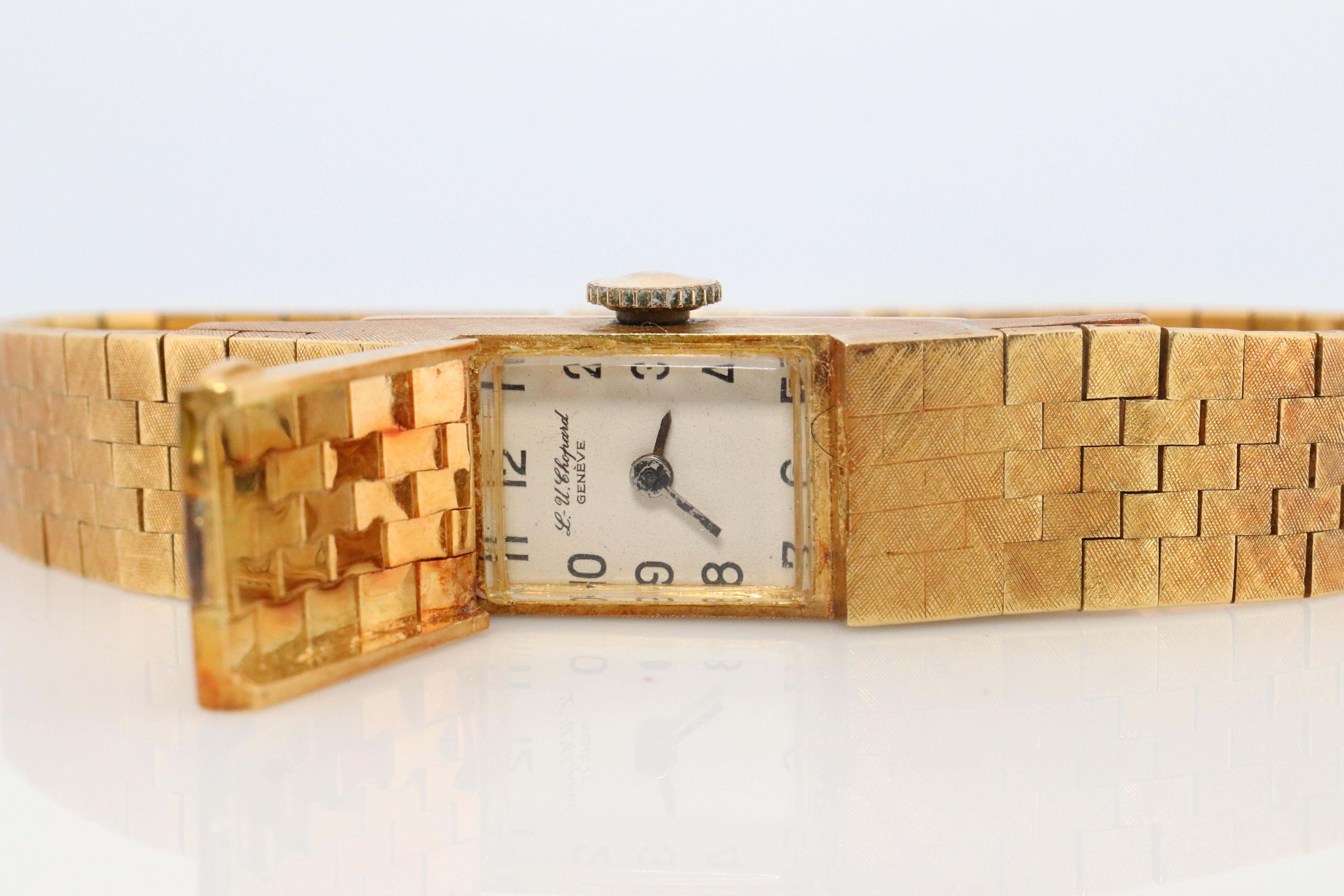 This is a rare piece that does not come up for sale often. In fact, you will probably not see one like this for sale.
Elegant and minimalistic wristwatch and bracelet. 18k Gold panther bracelet with a manual watch hidden under a golden flap.

LUC