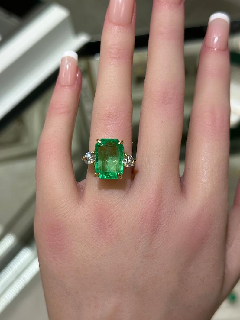 Contemporary 18K Colombian Emerald & Diamond Ring  8.92tcw Emerald Cut  Vivid Green For Sale
