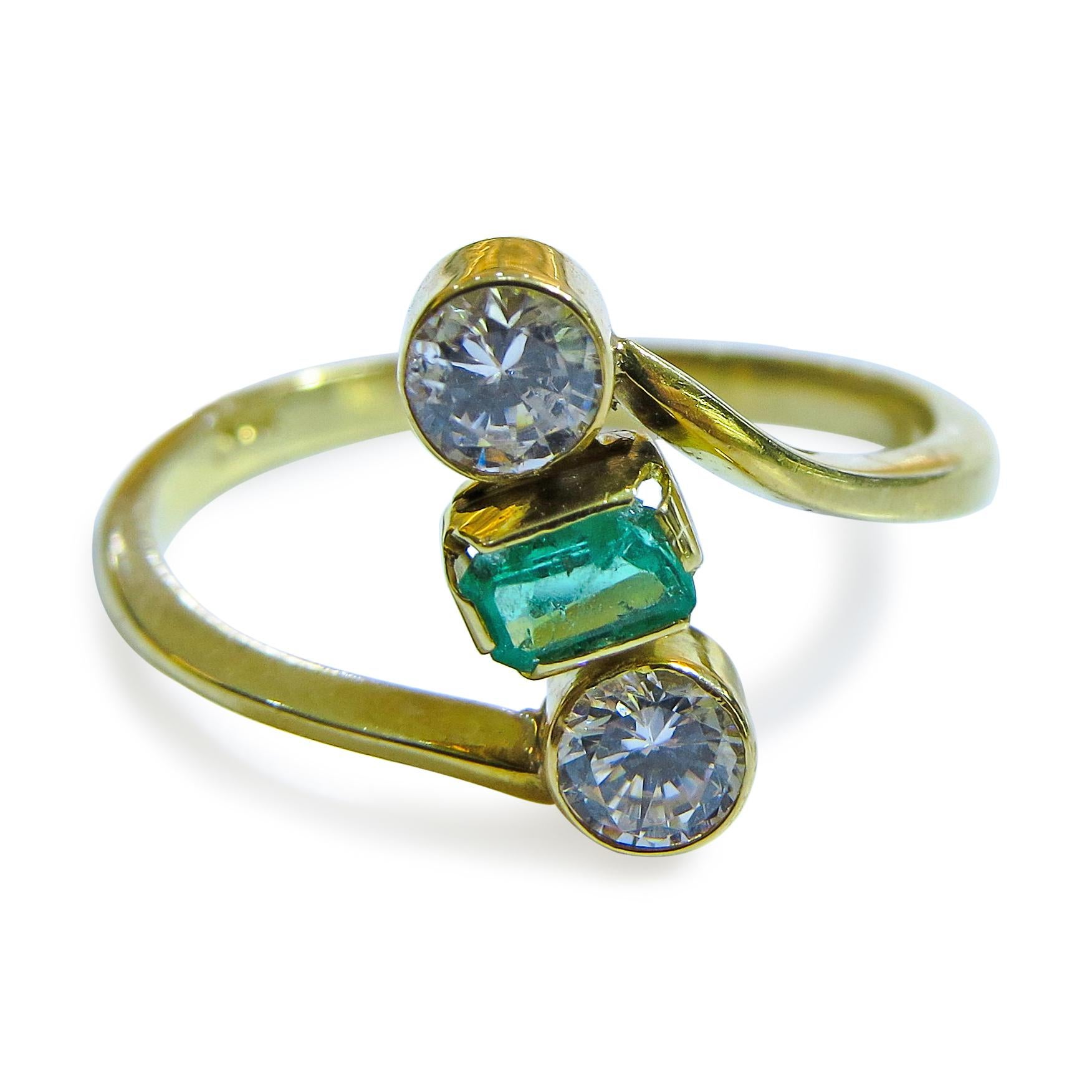 18K Yellow Gold 
Weight= 2.2 gr 
Size= 2 1/2 
Colombian Emerald= 0.30 Ct total
Side Stones= C.2  
Year= 1980