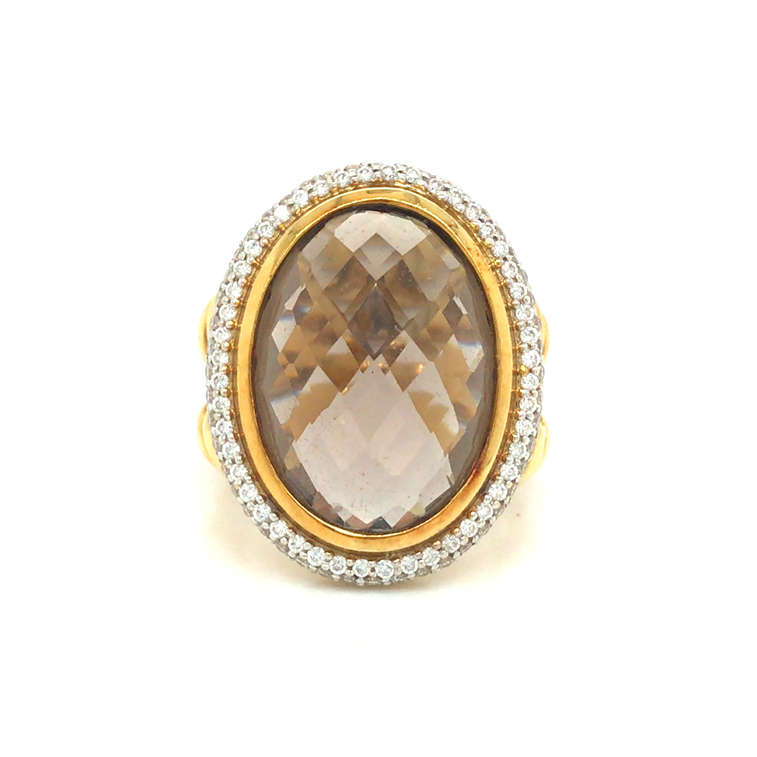 David Yurman Albion Oval Citrine Diamond Cable Ring in 18K Two-Tone Gold.  Round Brilliant Cut Diamonds weighing 0.75 carat total weight, G-H in color and VS in clarity are expertly set surrounding the Center Citrine.  The Ring measures 1 inch in