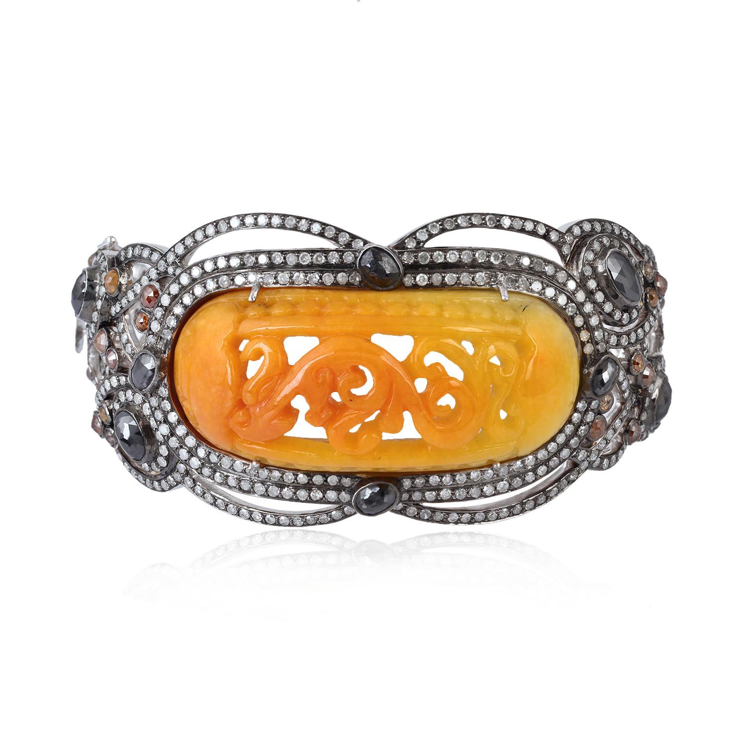 orange designer bracelet